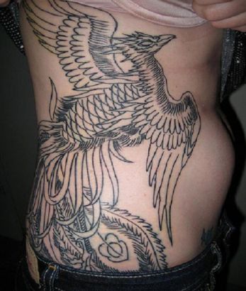 Tribal Phoenix Pic Tattoo On Rib